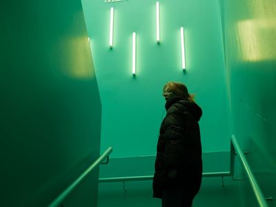 Calm gym atmosphere with subtle teal neon lighting